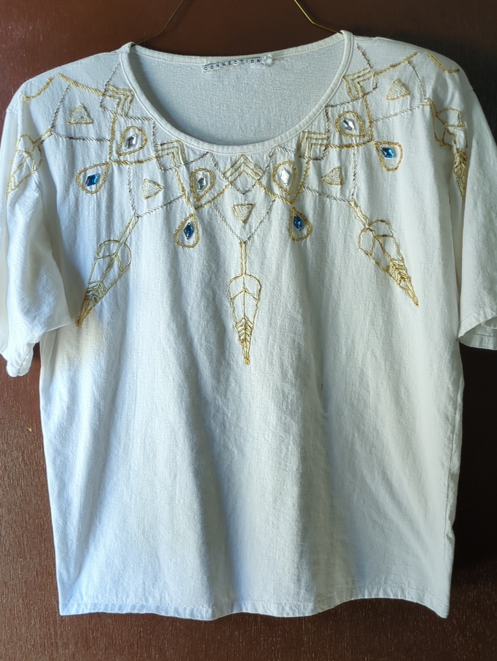 Women's White Scoop Neck Tee with Gold Beaded Neckline and Blue Accents